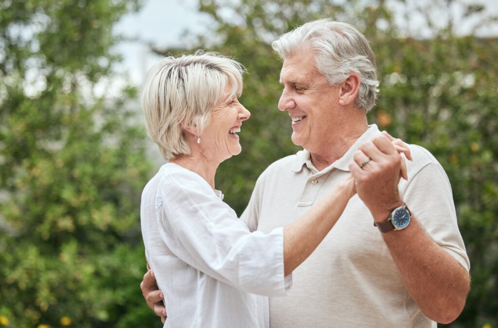 couple dancing enjoying. Ballroom dancing is a common hobby for people over 40.